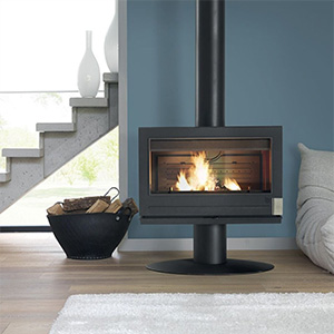 Modern suspended wood-burning fireplace beneath staircase with integrated log basket in contemporary living room.