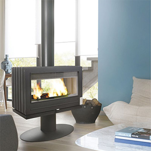 Modern suspended wood-burning fireplace with panoramic glass front in bright contemporary living space.